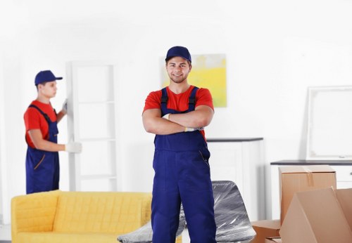 Loading furniture into a van for transport in Enfield