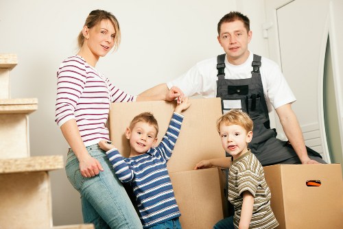 Organized storage unit with sofas, tables, and household furniture in Enfield